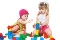 Two cute girls playing with building blocks Royalty Free Stock Photo