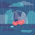Two cute hearts standing under an umbrella in rainy weather.