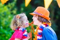 Two cute kids Dutch football supporters Royalty Free Stock Photo