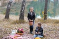 Two cute kids, little girl and her brother, having a picnic in the park Royalty Free Stock Photo