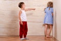 Two Cute Kids Playing Hide and Seek Royalty Free Stock Photo