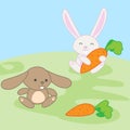 Two cute little baby bunnies playing with carrots