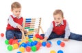 Two cute little boys playing with toys Royalty Free Stock Photo