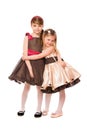 Two cute little girls in a dress. Isolated Royalty Free Stock Photo