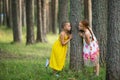 Two cute little girls friends in pine Park. Walking.