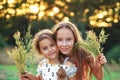 Two  little girls hugging and smiling at the countryside. Happy kids spending time  outdoors Royalty Free Stock Photo