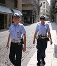 Two cute policewoman on patrol on the streets of the historic streets of the ancient city of Verona Italy