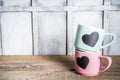 Two cute tea cups with chalkboard hearts