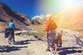 Two cyclist standing on mountains road. Himalayas, Jammu and Kashmir State, North India Royalty Free Stock Photo