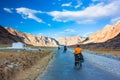 Two cyclist standing on mountains road. Himalayas Royalty Free Stock Photo
