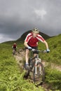 Two Cyclists On Countryside Track Royalty Free Stock Photo