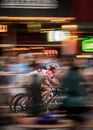 Two Cyclists Race for Twilight