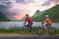 Two cyclists relax biking outdoors