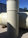 Two cylindrical custom welded plastic tanks