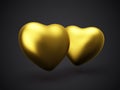 Two 3D glamorous golden heart on black background.