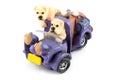 Two dags riding in a purple car Royalty Free Stock Photo