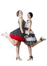 Two dancing girls on a white background