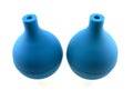 Two dark blue rubber enemas