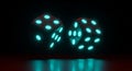 Two glowing cyan dice floating in darkness with reflection gambling game Royalty Free Stock Photo