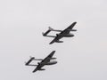 Two de Havilland Vampires Circling over Dunsfold Airfield