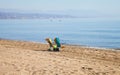 Two deckchairs on golden sandy beach in Spain