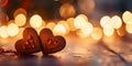 Two Decorated Gingerbread hearts on empty wooden table