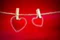 Two decorative hearts  clothespins on a rope Royalty Free Stock Photo