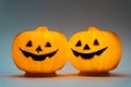 Decorative lanterns in form of Halloween pumpkins isolated on a gray background