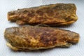 Two deep fried fishes Royalty Free Stock Photo