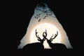 Two deers in cave. Animal family silhouette. Full moon in night sky Royalty Free Stock Photo