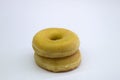 Two Delicious Classic Donuts Stack on White Background