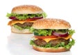 Two delicious hamburgers isolated Royalty Free Stock Photo