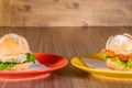 Two delicious hamburgers on wooden background Royalty Free Stock Photo