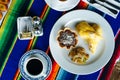 Two delicious indigenous mexican Rolls made with egg omelette with mole and onion Royalty Free Stock Photo