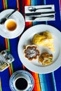 Two delicious indigenous mexican Rolls made with egg omelette with mole and onion Royalty Free Stock Photo