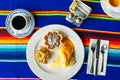 Two delicious indigenous mexican Rolls made with egg omelette with mole and onion Royalty Free Stock Photo