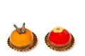 Two delicious looking small round cakes on a white background with space for copy