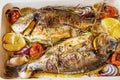 Two delicious whole baked fish.