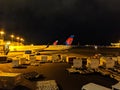 Two Delta Airlines Planes parked at Honolulu International airport at night Royalty Free Stock Photo
