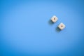 Two dice on a blue Royalty Free Stock Photo