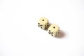 Two dice double number one on a white background. gambling abstraction