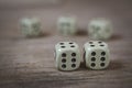 Two dice number double six on a wooden table Royalty Free Stock Photo
