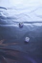 Two dice on silver background Royalty Free Stock Photo