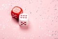 Two dices with hearts on pink background Royalty Free Stock Photo