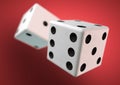 Two die (dice) captured rolling in mid air. Throwing dice in casino, board game Royalty Free Stock Photo