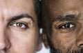Two different ethnic men`s eyes closeup