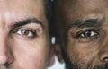 Two different ethnic men`s eyes closeup Royalty Free Stock Photo