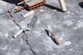 Various masonry and brickwork tools being used on a construction site