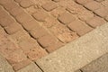 Two different paving stones new and old on top in yellow tint Royalty Free Stock Photo