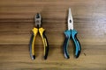 Two different pliers for carpentery and mechanic use